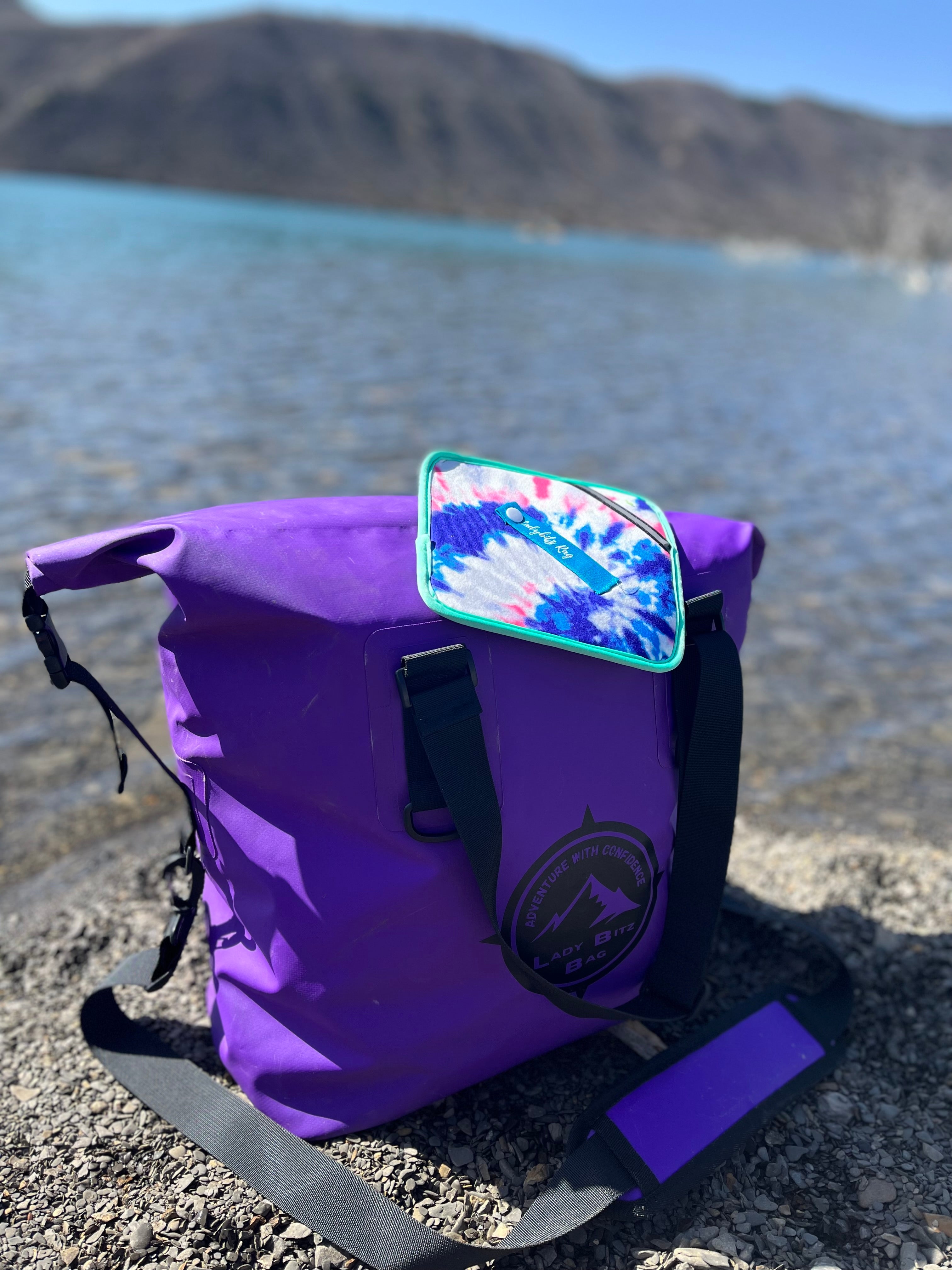 ladybitz bag on Lake Nighthorse in Durango Colorado. Odor-Absorbing pocket inside and ladybitz pee cloth on top of bag. 