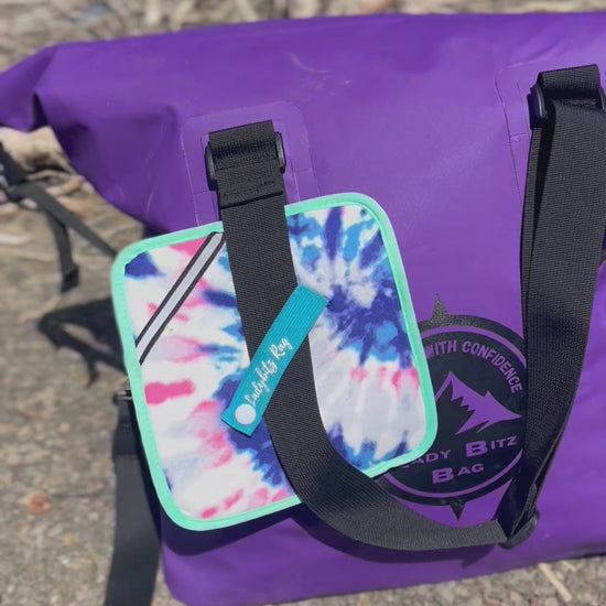 Pee cloth clipped onto the 50L ladybitz drybag for easy carry